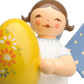 Engel mit gelbem Osterei