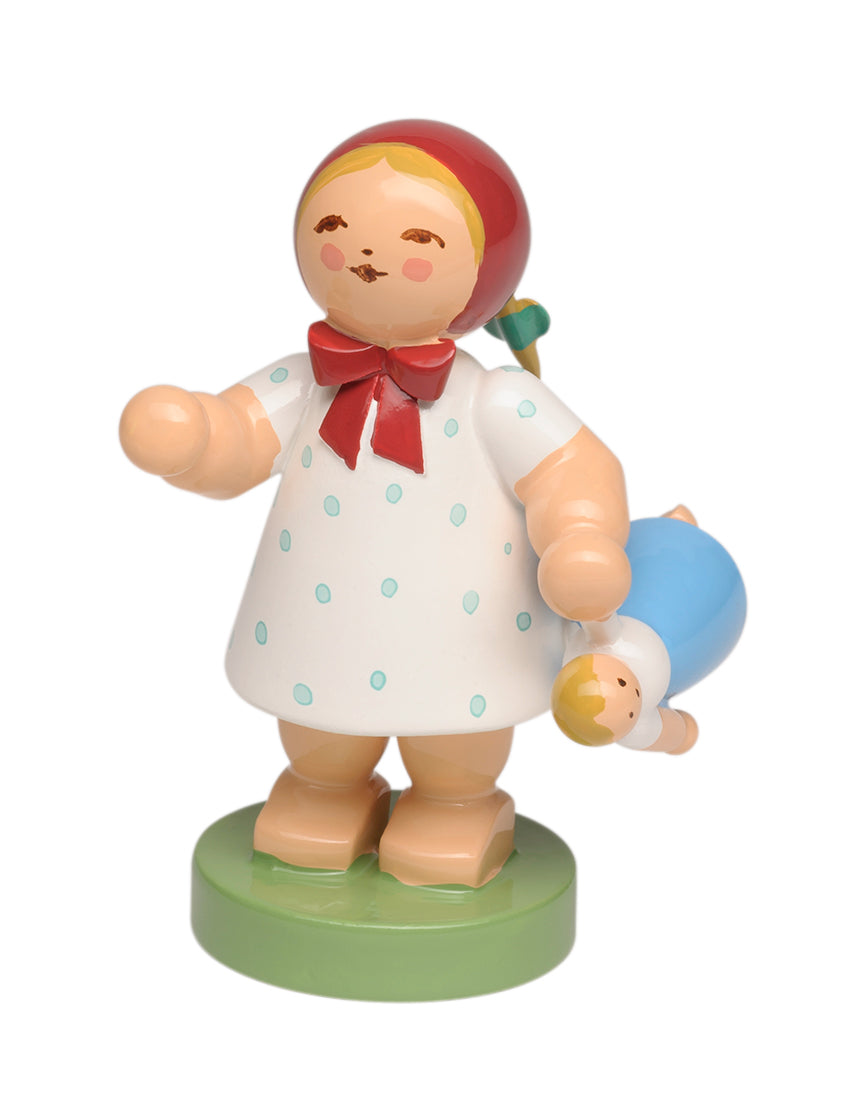 Mädchen mit Puppe