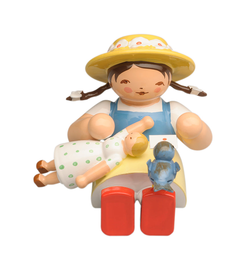 Girl with a bird on foot