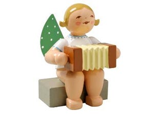 Angel with harmonica, sitting