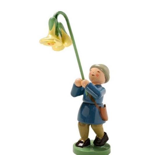 Junge mit Schlüsselblume